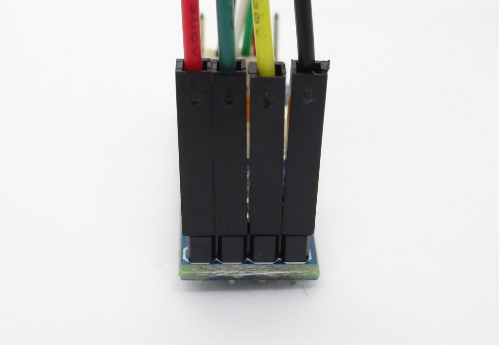 Jumper wire connections on the <em></noscript>Level Converter</em> board.