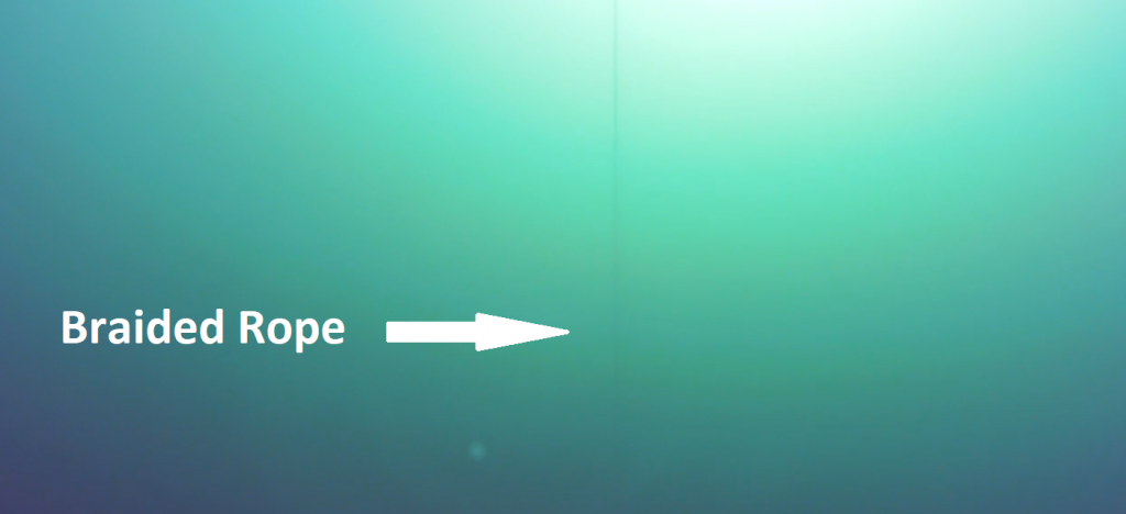 ROV view of a vertical rope in low-visibility water