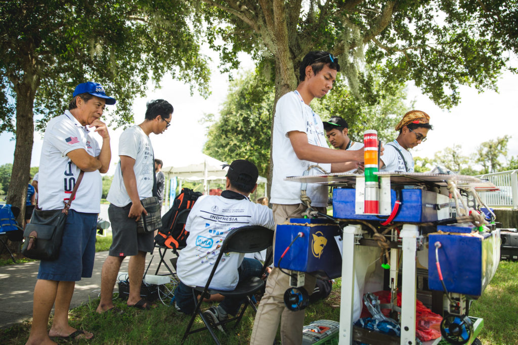 RoboBoat team and their vehicle. (Credit: RoboNation)