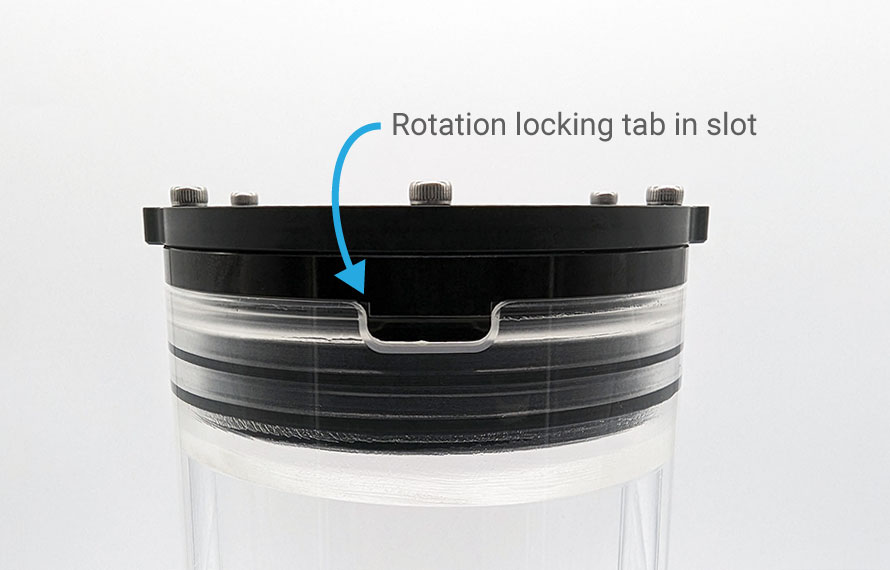 Rotation locking tab in slot.